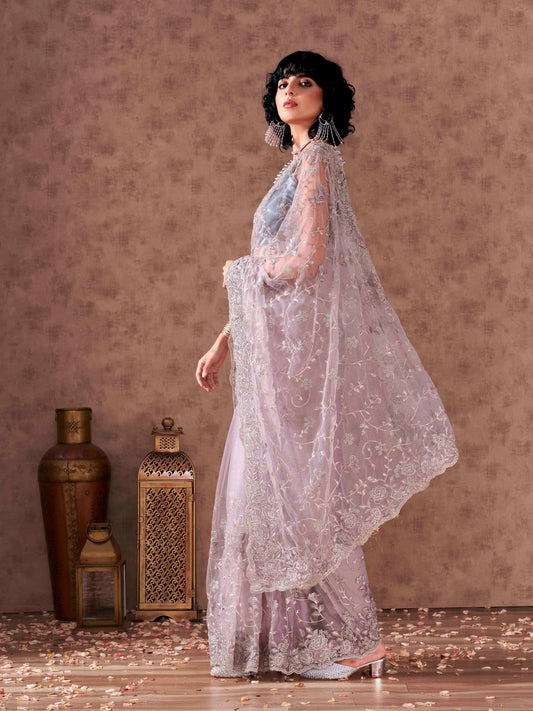 Mauve colored heavy embroidered net saree