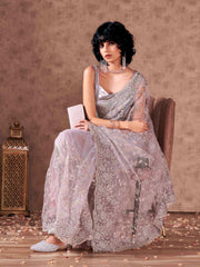 Mauve colored heavy embroidered net saree