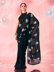 Black colored thread embroidered poly georgette saree with faux diamond along with crochet lace and embroidered blouse