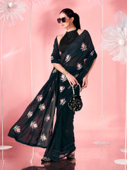 Black colored thread embroidered poly georgette saree with faux diamond along with crochet lace and embroidered blouse