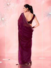 Magenta colored saree with faux diamond on border and tassles on pallu