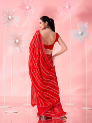 Red colored fancy embellished saree