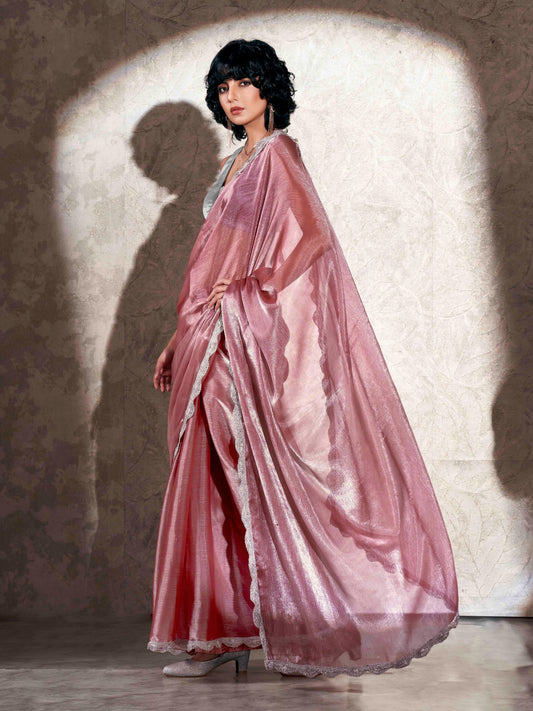 Pink colored shimmer chiffon saree with embellished border