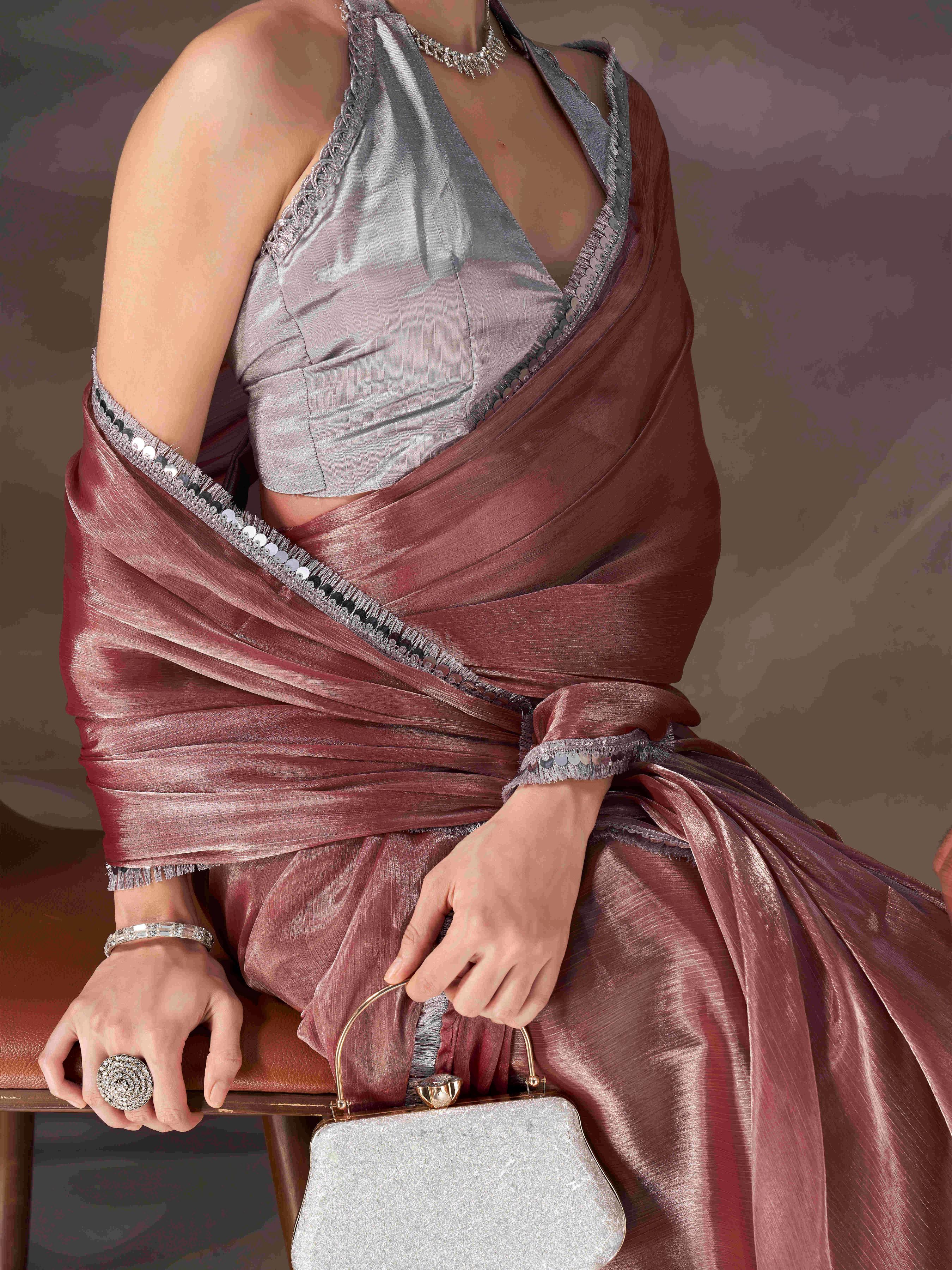 Metallic colored shimmer satin chiffon saree with embellished lace