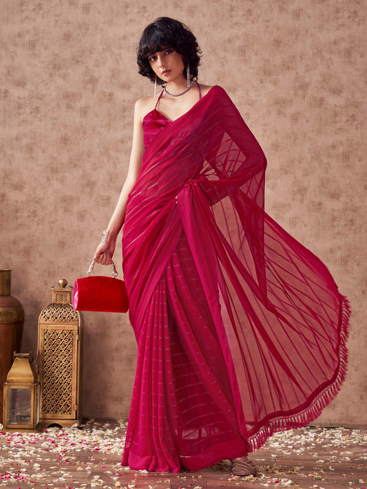 Maroon colored striped saree with embroidered blouse