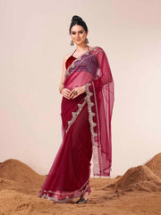 Maroon colored net embroidered saree