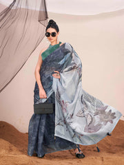 Metallic blue colored digital printed shimmer chiffon saree with tassles on pallu