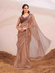 Copper colored organza saree with fur blouse and embellished border