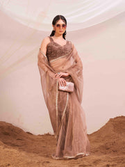 Copper colored organza saree with fur blouse and embellished border