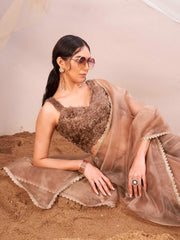 Copper colored organza saree with fur blouse and embellished border