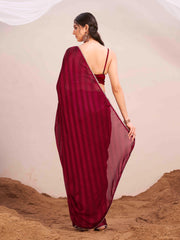 Maroon colored lehariya woven saree with embellished border