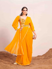 Yellow colored poly georgette saree with embroidered blouse and belt