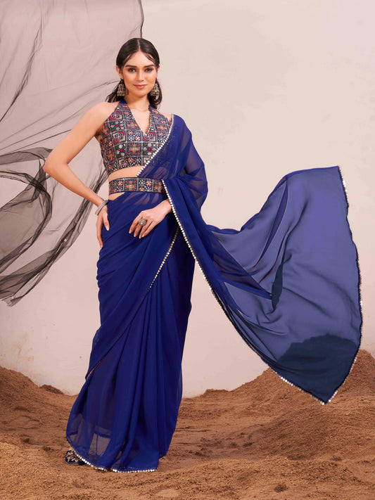 Blue colored poly georgette saree with embroidered blouse and belt