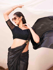 Metallic Charcoal black colored designer satin saree with embroidered blouse and metallic ring on waist to accentuate the pallu