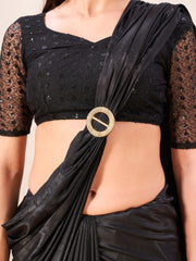 Metallic Charcoal black colored designer satin saree with embroidered blouse and metallic ring on waist to accentuate the pallu