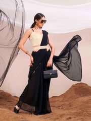 Black colored poly georgette saree with embroidered blouse and belt