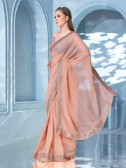 Peach colored sequined embroidered crunchy saree with brocade blouse