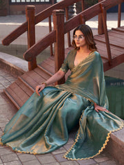 Two toned olive green and gold colored jimmy choo saree with brocade blouse and embroidered lace