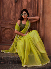 Green colored shimmer chiffon saree with embellished lace and brocade blouse