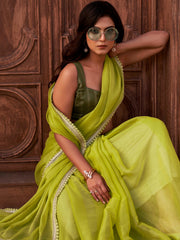 Green colored shimmer chiffon saree with embellished lace and brocade blouse