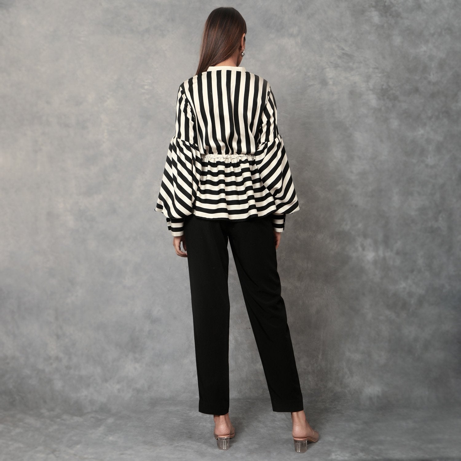 Black and white striped peplum top