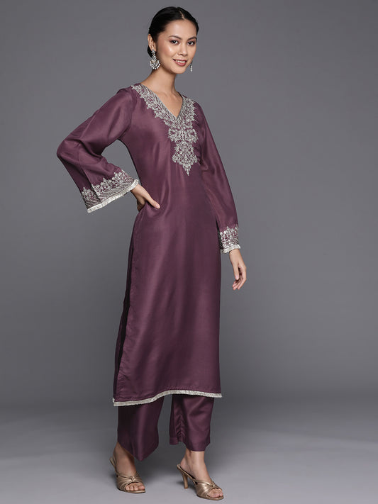 mauve V-neck yoke embroidered straight kurta with fringes hem paired with tonal bottom and tonal dupatta with fringes