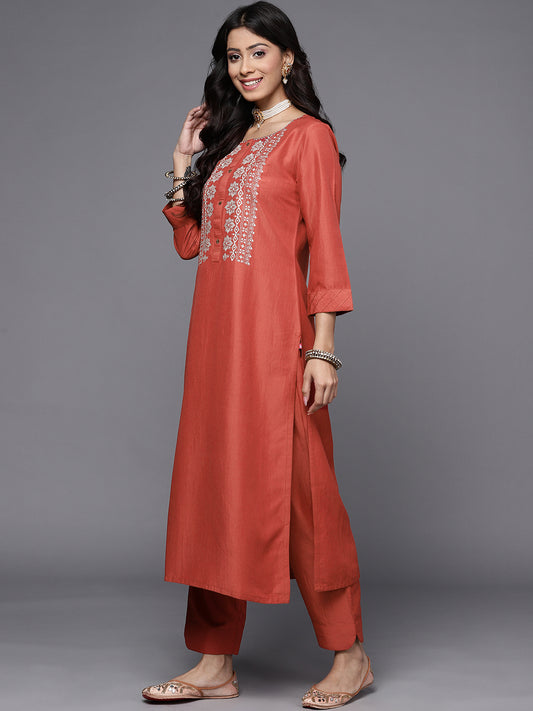 women rust embroidered kurta set paired with dupatta