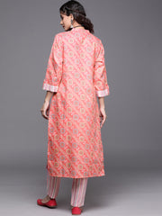 women kurta with button down paired with vertical strip printed pant