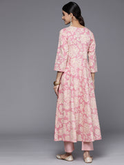 Women pink floral printed angrakha style anarkali kurta paired with printed bottom.