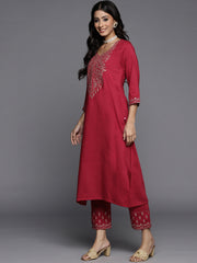 women embroidered kurta paired with embroidered trouser and ombre dupatta