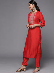 women rust emroidered kurta sets with round neck