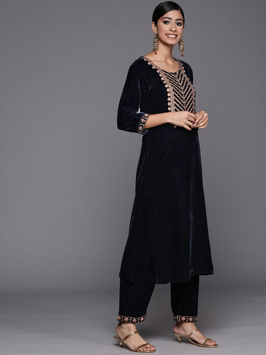 navy blue velvet embroidered kurta paired with embroidered trouser and dupatta