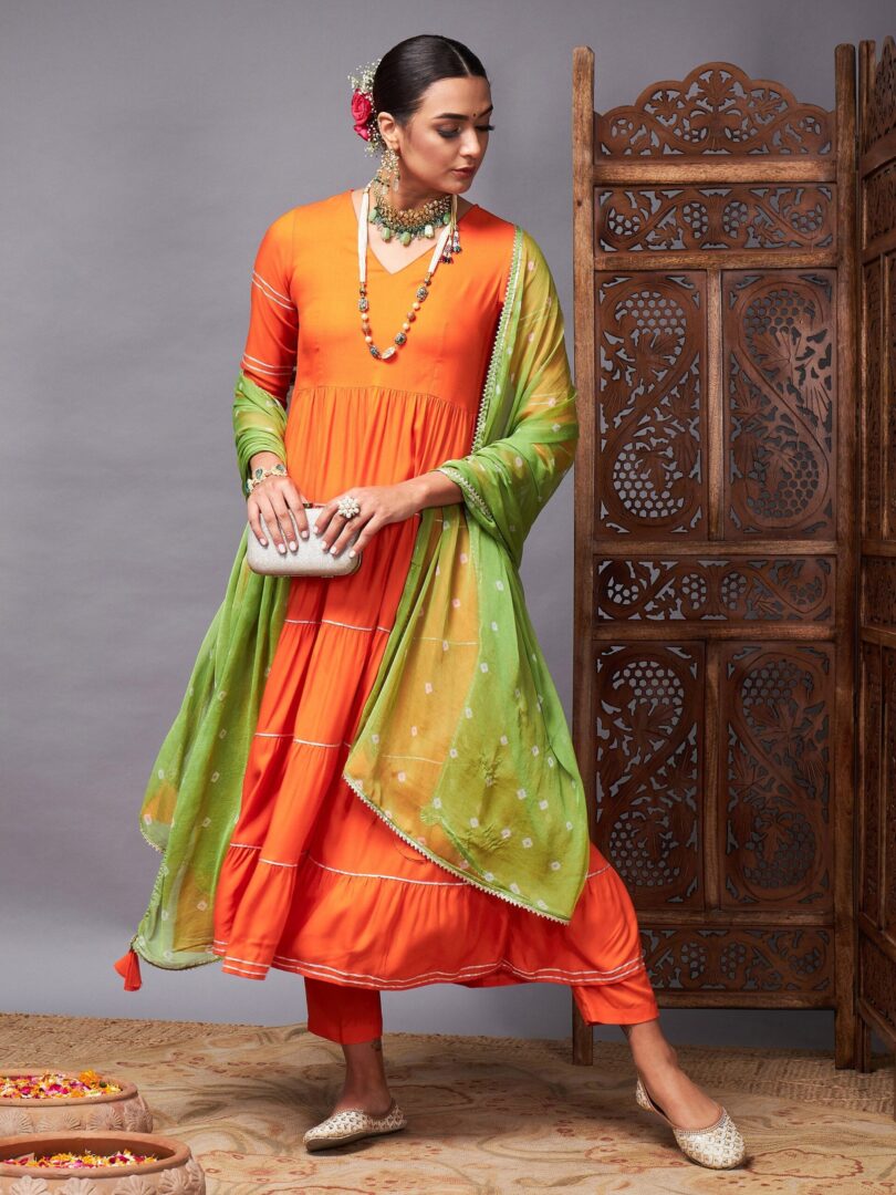 Women Orange Tiered Kurta Set With Green Bandhej Dupatta