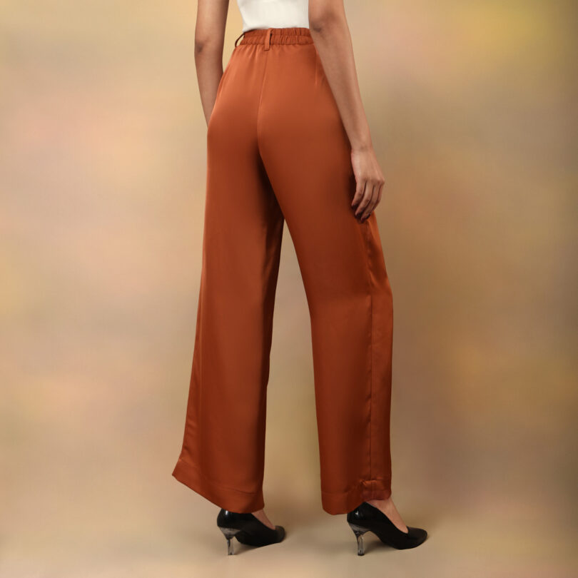 Rust coloured flared pants